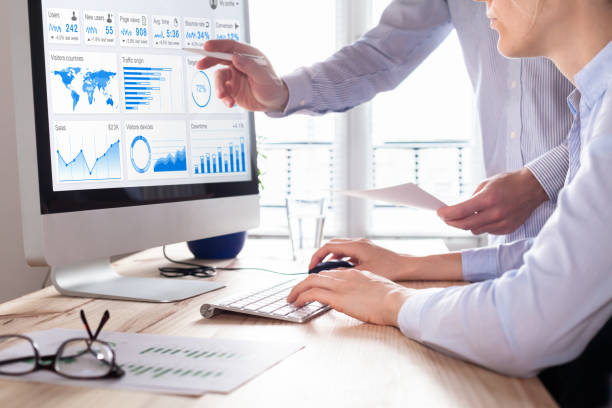 Email Marketing Specialist at HiDM Digital Marketing Institute analyzing campaign performance, open rates, click-through data, and conversion reports on computer dashboard.
