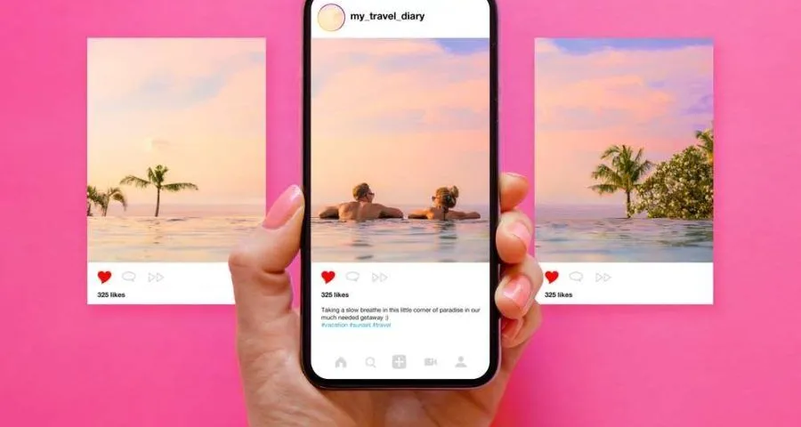 Hand holding a smartphone showing an Instagram travel post of a couple in an infinity pool, with the same image duplicated in the background, symbolizing the HiDM digital marketing mistake of using the same strategy for all platforms.