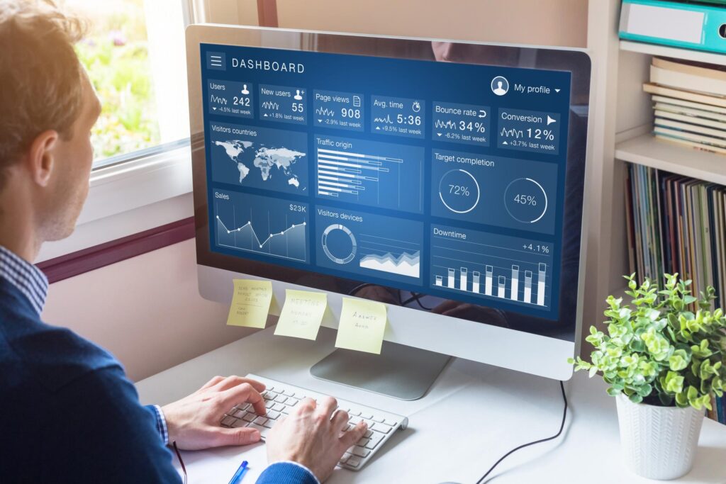 Digital marketer reviewing analytics reports and campaign data.
