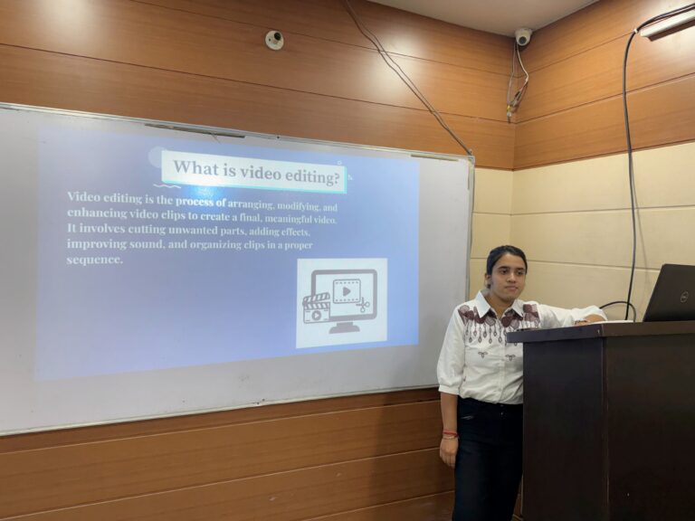 Instructor teaching video editing and content creation at HIDM